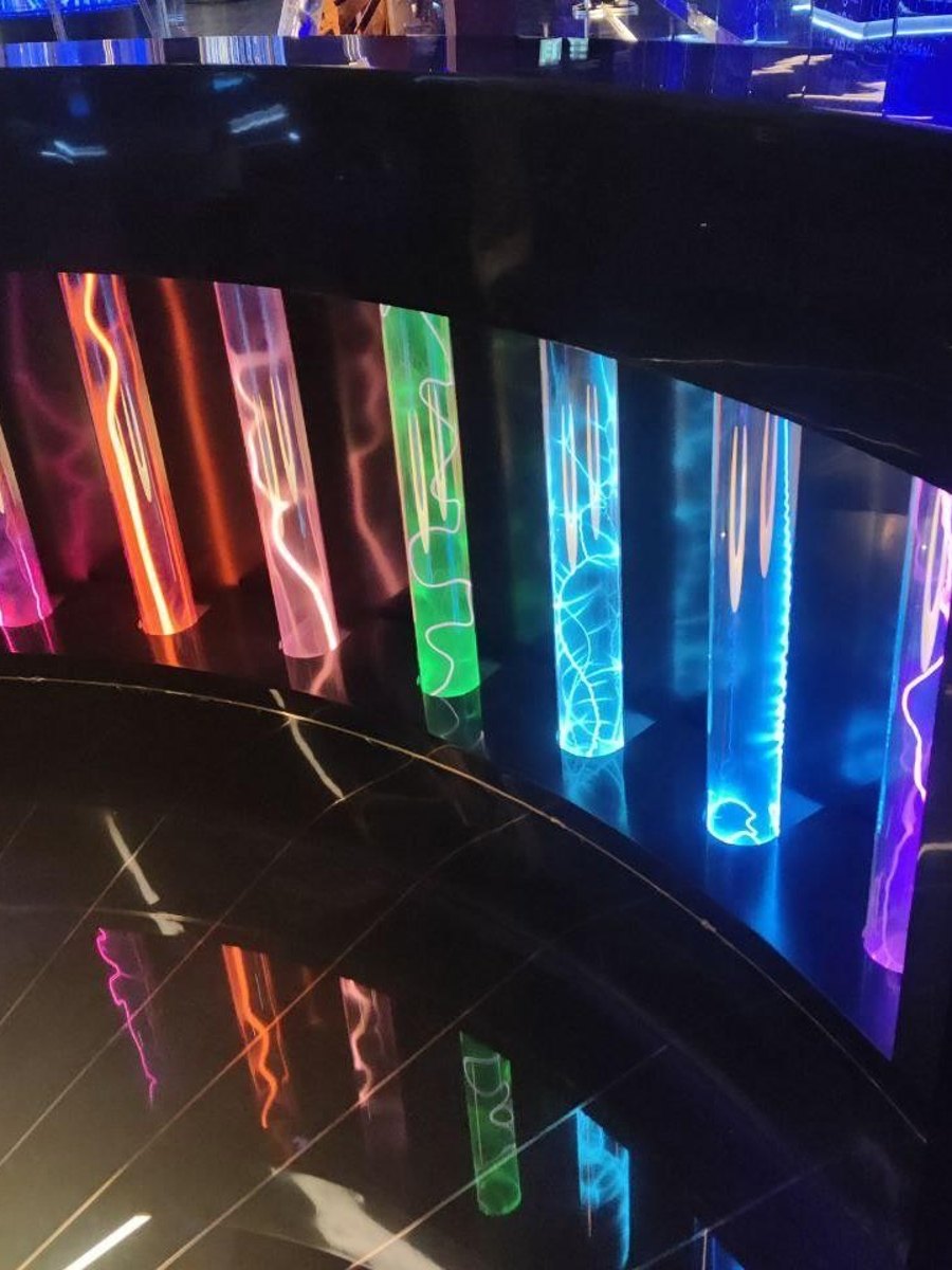 A display counter with seven built-in coloured plasma tubes