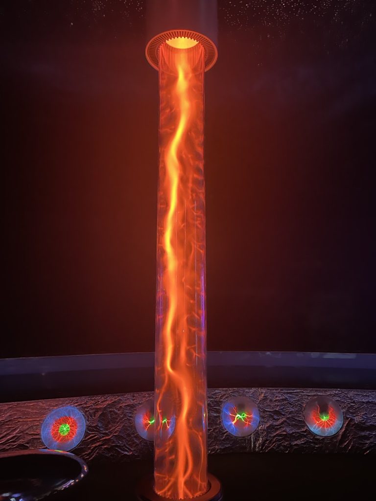 An Orange Tree plasma column, floor to ceiling