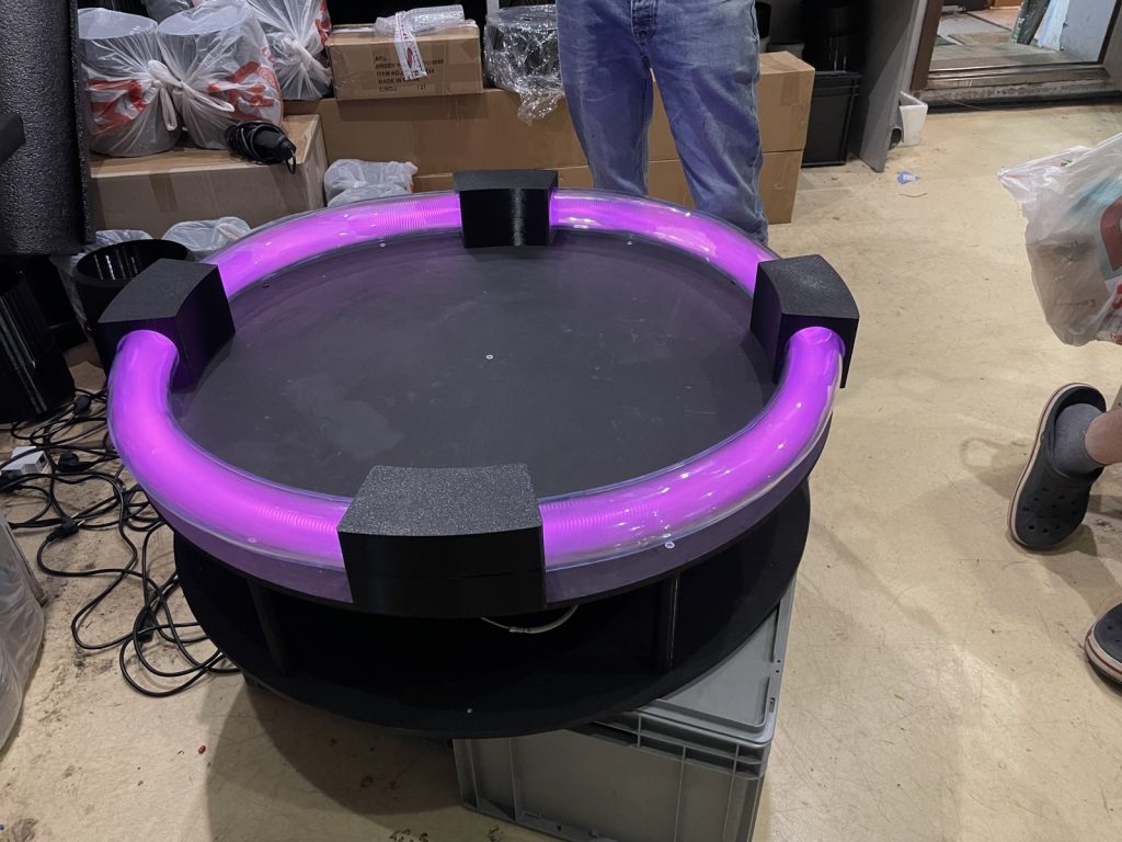 The torus glowing, with striations in the discharge