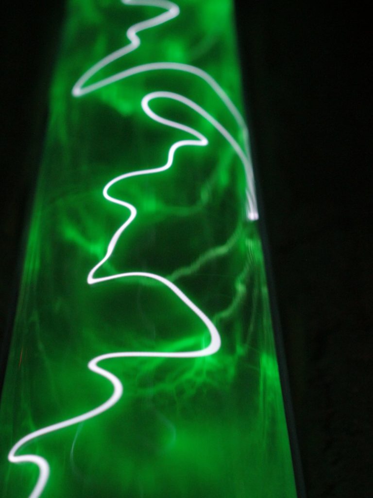 Green Arrow — a white discharge on the green glow, close up