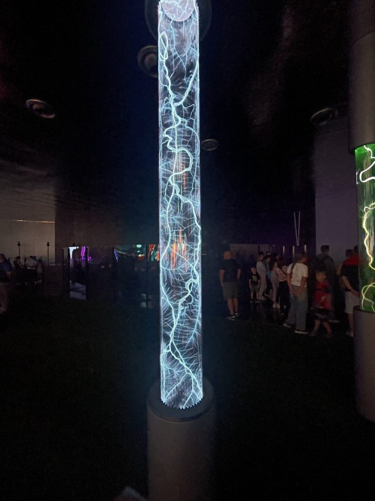 A floor-to-ceiling plasma column at the Summer in Moscow exhibition