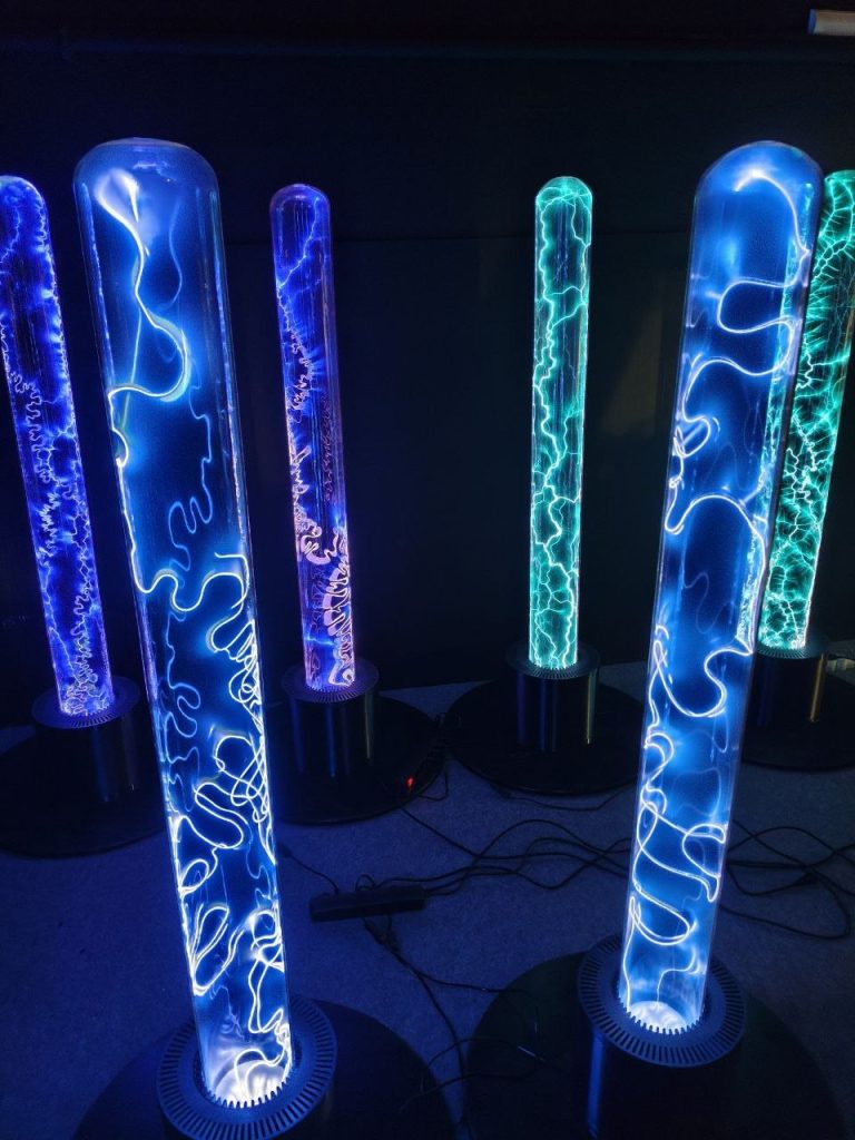 A row of Blue plasma columns in the dark
